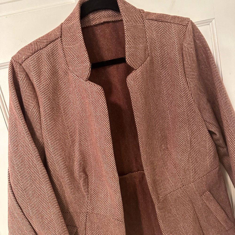 Beautiful pink and mauve herringbone blazer… Size XL great with a pair of jeans